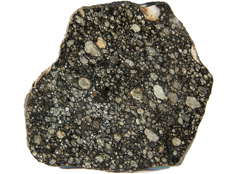 L 3 típusú kondrit meteorit határozott gömbölyű kerek peremű kondrulákkal. Könnyen felismerhető szerkezet, csak meteoritokra jellemző a minta!